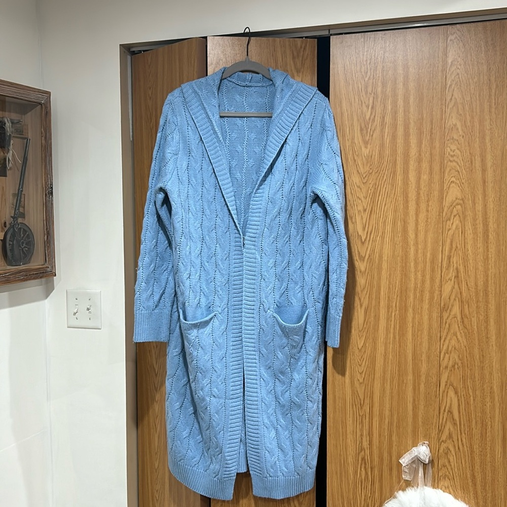 No name brand, ordered through Amazon, size XL. Light blue cardigan